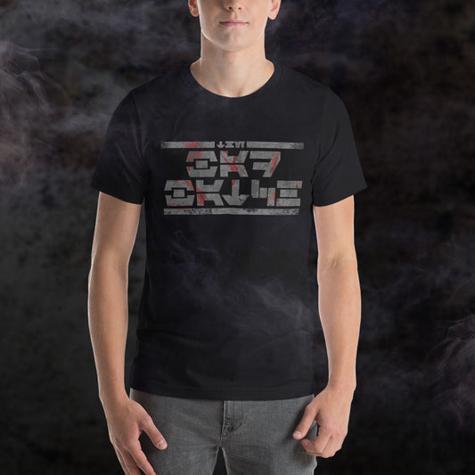 The Bad Batch logo but written in Aurebesh on a black t-shirt. The design is visually inspired by the Bad Batch's distressed logo.